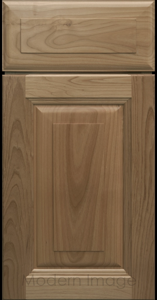 Durango raised panel cabinet door in a Warm Gray stain featuring a stepped molded frame.